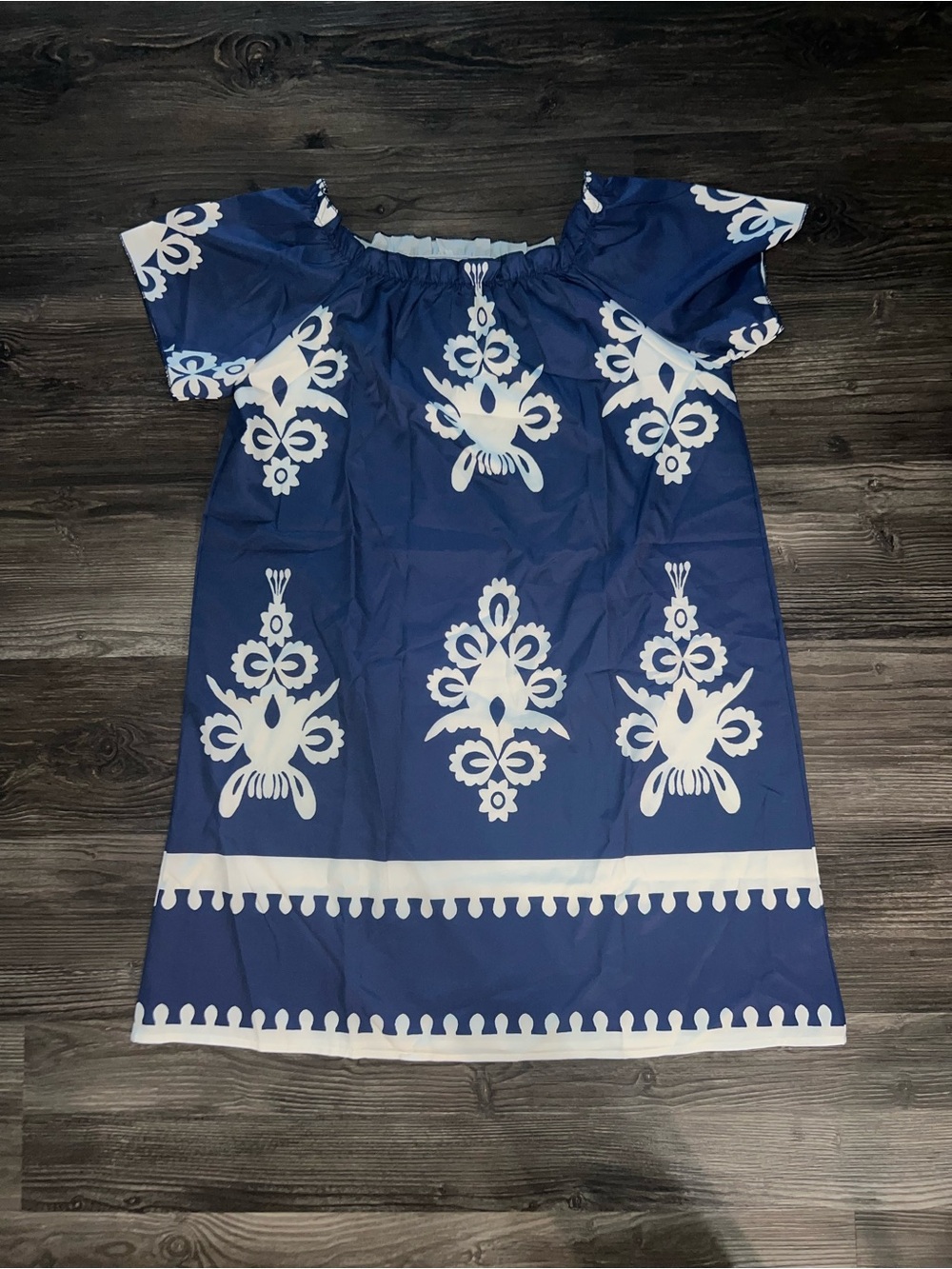 New without tags, never worn. Cute Navy Blue On/Shoulder Floral Print Dress